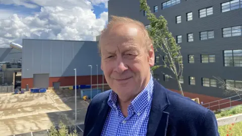 Neil Grimstone outside Rookery South Energy Recovery Facility in Stewartby, Bedfordshire