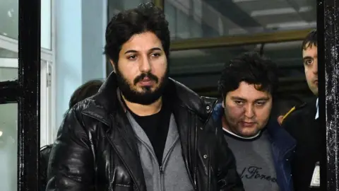 Anadolu Agency Reza Zarrab is taken into custody by Istanbul police (17 December 2013)