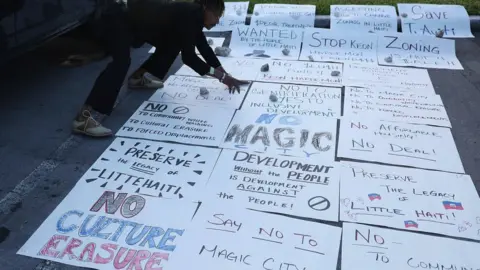 Getty Images Protest posters against Magic City laid out on the floor