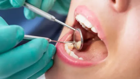 Getty Images Dental examination