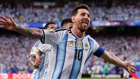 Lionel Messi celebrates