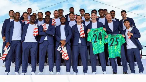 The United States team posing for a photo