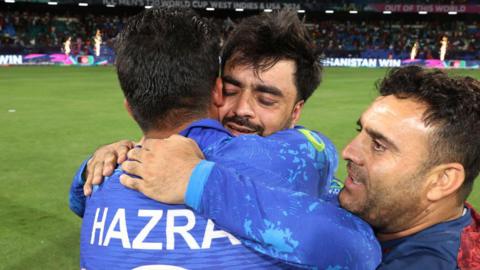 Rashid Khan celebrates Afghanistan's win over Bangladesh to reach the T20 World Cup semi-final