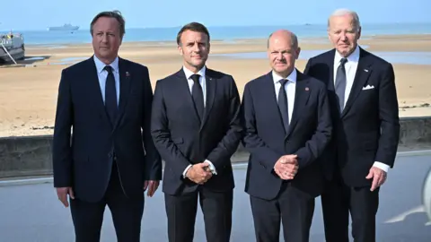 PA Media David Cameron, Emmanuel Macron, Olaf Scholz and Joe Biden attending the D-Day 80 International Ceremony at Omaha Beach, Normandy.