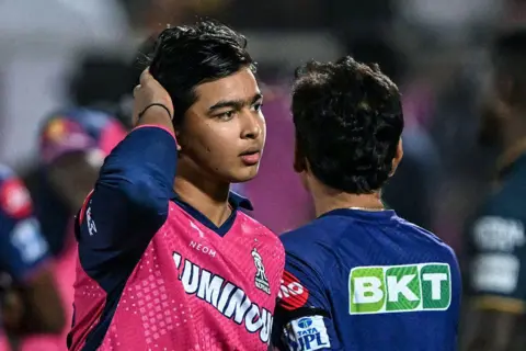 AFP via Getty Images Rajasthan Royals' Vaibhav Suryavanshi gestures at the end of the Indian Premier League (IPL) Twenty20 cricket match between Rajasthan Royals and Gujarat Titans at the Sawai Mansingh Stadium in Jaipur. 