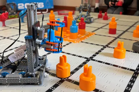 A robot made my primary children in action