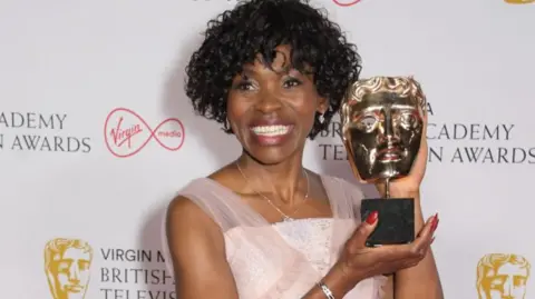Getty Images Rakie Ayola, winner of the Best Support Actress award for her role in "Anthony", poses in the Winners Room at the Virgin Media British Academy Television Awards 2021 