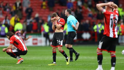 Sheffield United players disappointed after defeat by Nottingham Forest