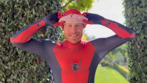PA Media Prince Harry dressed as Spiderman