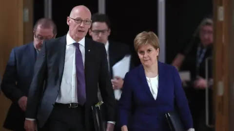 PA Media John Swinney