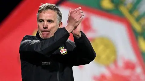 Wrexham manager Phil Parkinson applauds