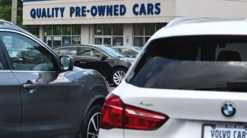 Getty Images A used car lot in Maryland.