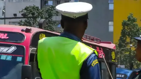 A Kenyan traffic police officer in 2022
