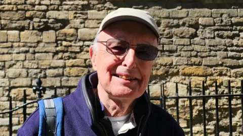 Man voting in Cambridge