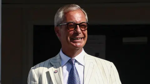 Nigel Farage pictured leaving a polling station during the Clacton by-election