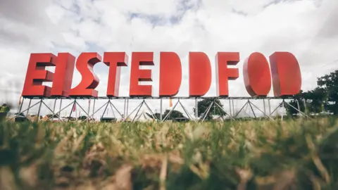 BBC A green field with large red letters spelling out EISTEDDFOD 