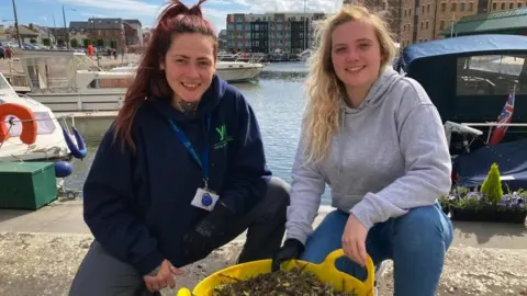 Amy and Beth from Young Gloucestershire emptying the Seabin