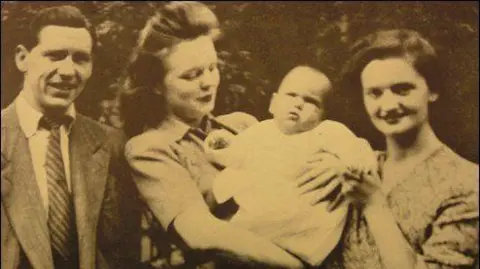 Family photo Timothy Evans, Mary Westlake, baby Geraldine and Beryl Evans outside Rillington Place