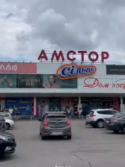 Marina Doohova A still from a video showing businesses open as usual two days before the attack
