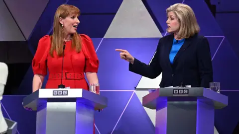 BBC Penny Mordaunt points at Angela Rayner during the BBC's election debate