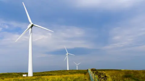 Getty Images Wind turbines