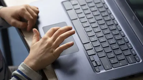 Getty Images Child with laptop