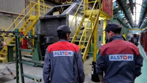 Reuters Employees work at the Alstom high-speed train TGV factory in Belfort, eastern France (file picture)