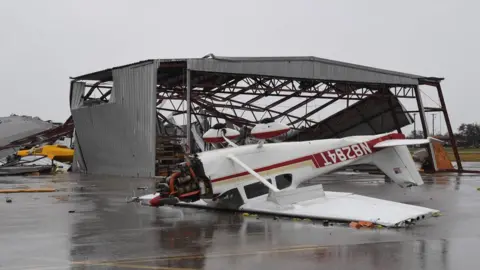 AFP A light plane sits upside down at Rockport Airport