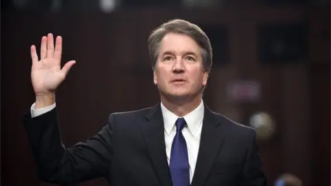 Getty Images Judge Brett Kavanaugh is sworn in during his US Senate Judiciary Committee confirmation hearing.