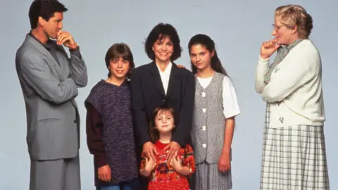 SNAP/REX/Shutterstock Pierce Brosnan, Matthew Lawrence, Sally Field, Mara Wilson, Lisa Jakub and Robin Williams in Mrs Doubtfire