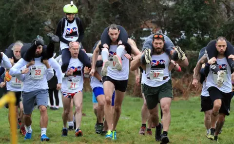 PA Christopher Hepworth with partner Tanisha Prince (centre)