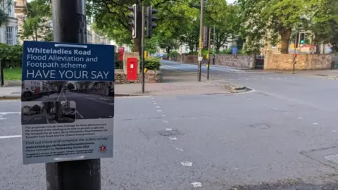 BBC Sign about scheme attached to lamp post