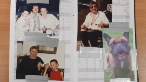 Police handout Photographs taped inside a diary