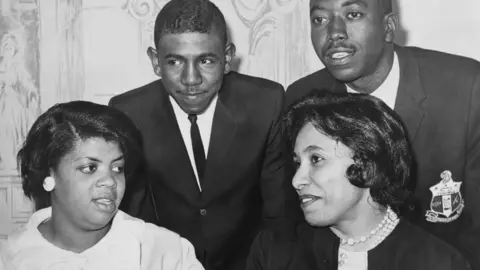 Library of Congress Linda Brown Smith (1st from left), Ethel Louise Belton Brown, Harry Briggs, Jr., and Spottswood Bolling, Jr. during press conference at Hotel Americana