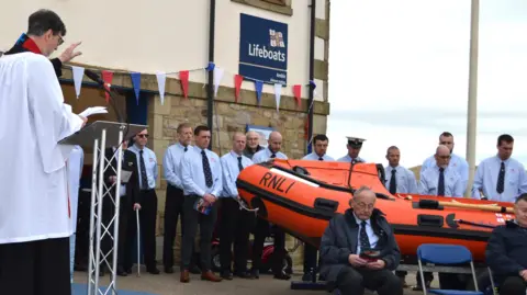 James Scott Vicar John McDermott from St Cuthbert's Parish Church