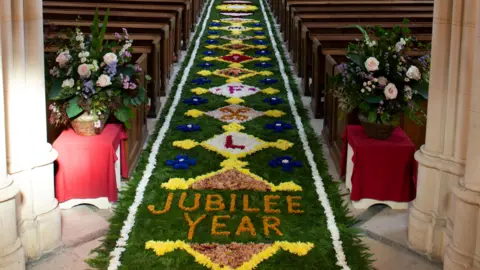 Arundel Cathedral The carpet of flowers filling the aisle of Arundel Cathedral.