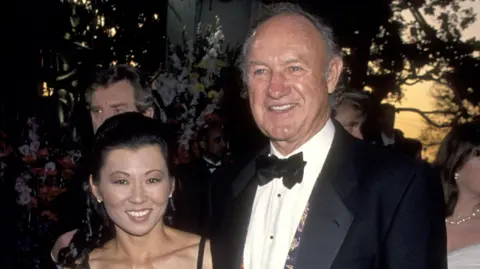 Getty Images Gene Hackman and Betsy Arakawa in black tie and a strappy black dress during 1994 66th Annual Academy Awards 