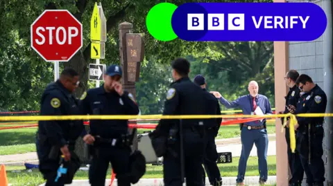 Getty Images Police officers attend a crime scene in Wisconsin, US.