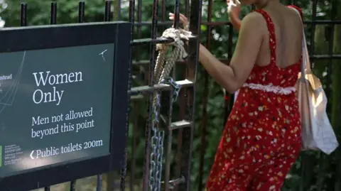 Getty Images The sign indicating the 'Women Only' swimming pool is seen attached to gates on Hampstead Heath in central London on June 27, 2018