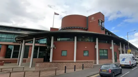 Google External view of Preston Crown Court on a dry and cloudy day.