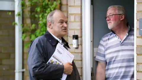 PA Media Lib Dem leader Sir Ed Davey speaks to residents in Ampthill, as he kick-starts the campaign in Mid-Bedfordshire