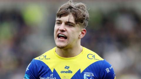 Leon Hayes of Warrington Wolves looks on during the Betfred Challenge Cup match between St Helens and Warrington Wolves at Totally Wicked Stadium on April 14, 2024 in St Helens, England.