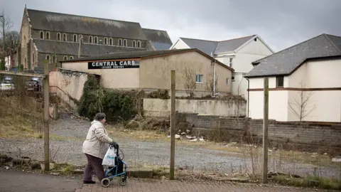 Getty Images A woman walking in Ebbw Vale