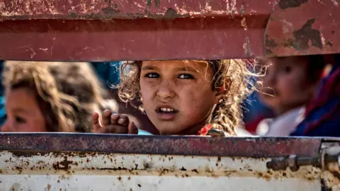 AFP Child refugees from offensive arrive in Syria's north-western Hassakeh province - 10 October