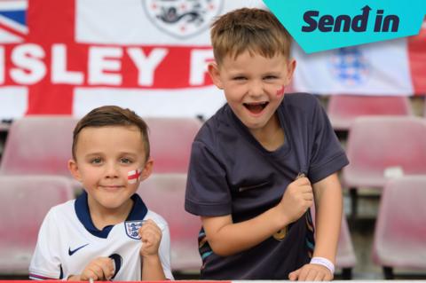 Two boys supporting England