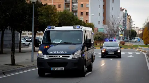 EPA Police vehicles that carry the five men from Seville accused of an alleged gang rape