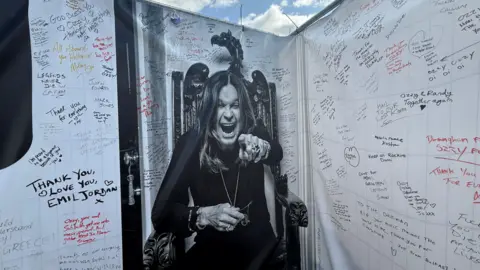 Banner with written tributes to Ozzy Osbourne