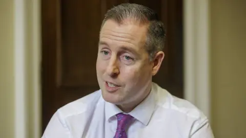 Liam McBurney/PA Media Paul Givan