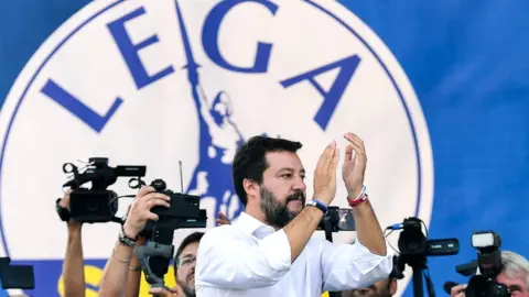 Matteo is applauded at the League's annual rally in Pontida on 15 September