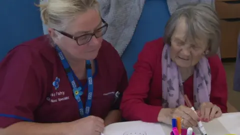 BBC Nurse and patient in Broadgreen Hospital